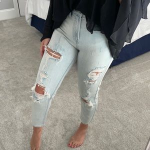 High waisted light washed ripped jeans